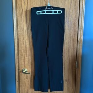 Calvin Klein black stretchy pants, pull on, worn once, side bottom slit!